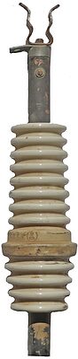 "W in a circle" (Westinghouse), White; Neat bushing or fuse element